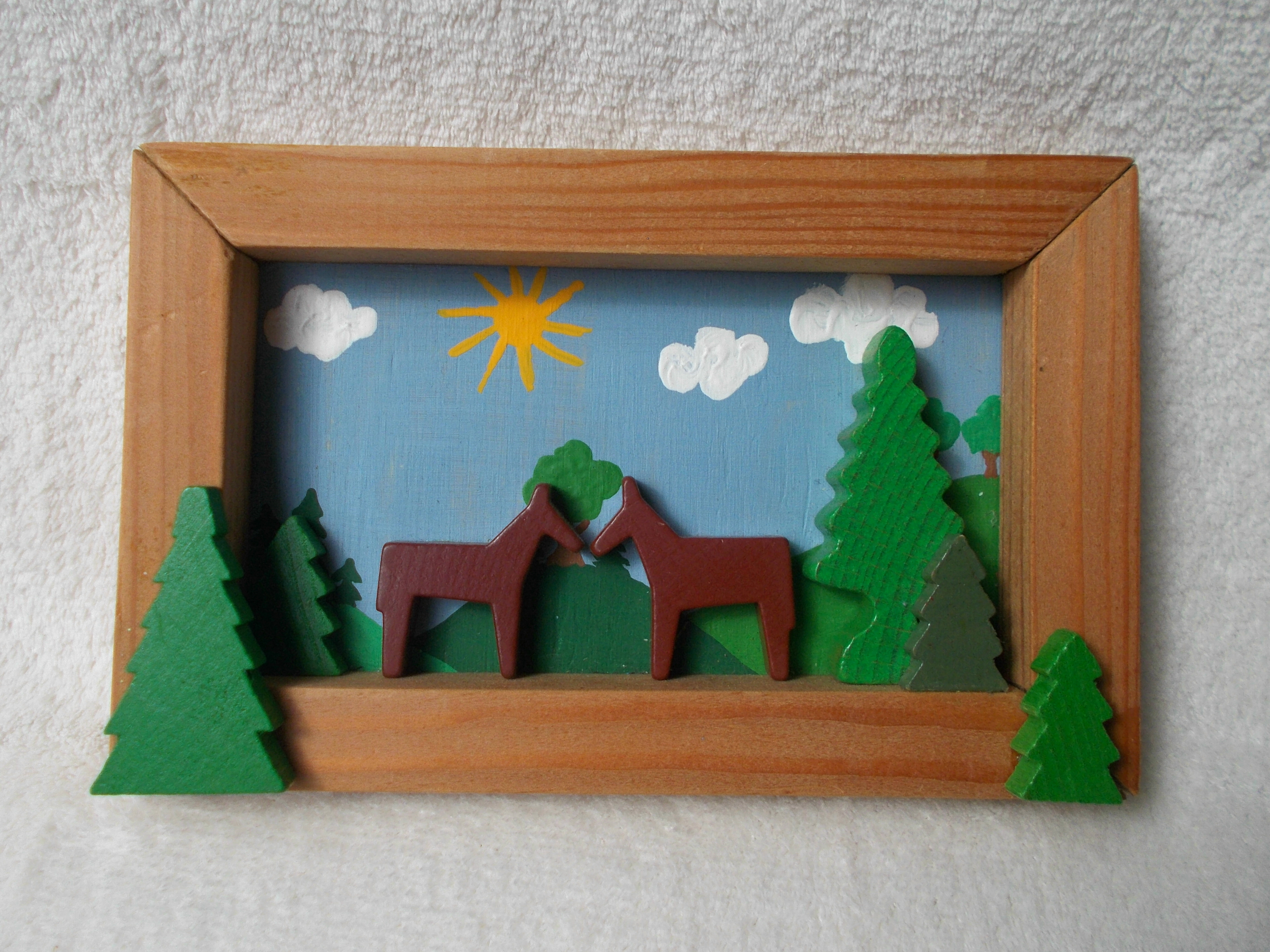 Holzreliefbild Pferde